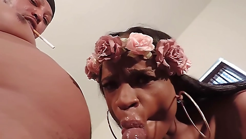 Ebony girl with a tattoo in her pussy gets her mouth filled