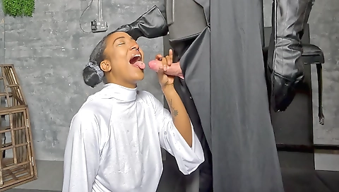 Ebony and brunette with tattooed feet doing a footjob