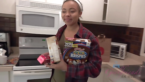 Solo ebony in boots and stockings is beach with a towel