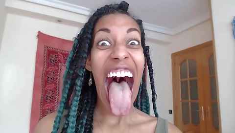 Ebony teen in a tight black stockings sucking a big stick