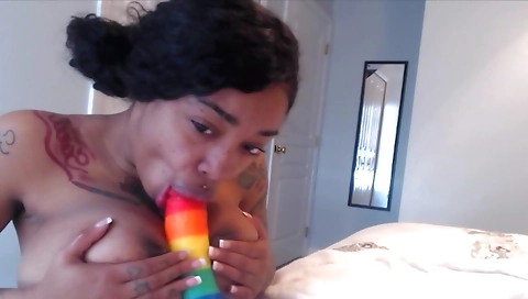 Busty brunette gives a blowjob and rides a vibrator