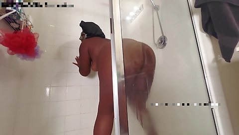 Ebony beauty in black panties enjoys her sex toy in the shower