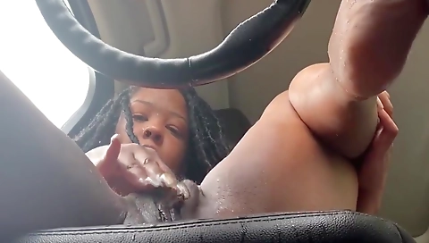 Ebony milf with a tattooed ass shows you some hot pussy