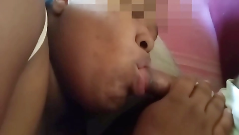 A beautiful ebony gets her face covered with cum from a man