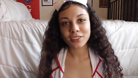 Ebony nurse takes a dildo and a dildo inside herself