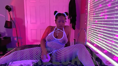 Ebony brunette with big boobs in her bed riding toy